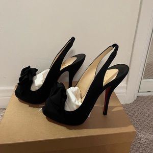 CL red bottoms. Never been worn. Everything included